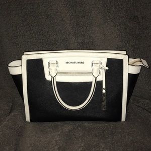 Black and white Michael Kors purse